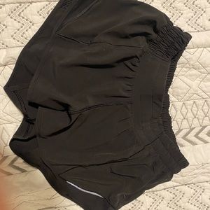 Lululemon 2.5 black Hotty Hot shorts (size 4)